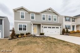105 Vesper Cir, Lodi, OH 44254 - view of front of house featuring driveway and a garage
