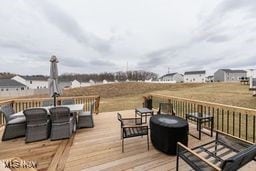 105 Vesper Cir, Lodi, OH 44254 - wooden deck with outdoor dining space