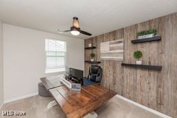 105 Vesper Cir, Lodi, OH 44254 - living room with wooden walls and a ceiling fan