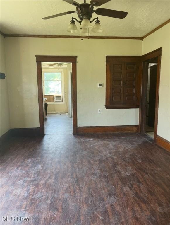 501 W 21st St, Lorain, OH 44052 - unfurnished room featuring ceiling fan, wood finished floors, ornamental molding, and a textured ceiling