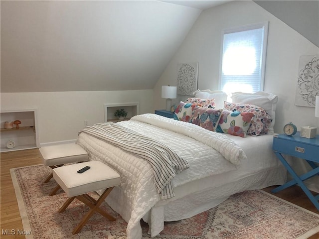 6704 Northcliff Ave, Brooklyn, OH 44144 - bedroom featuring lofted ceiling and wood finished floors