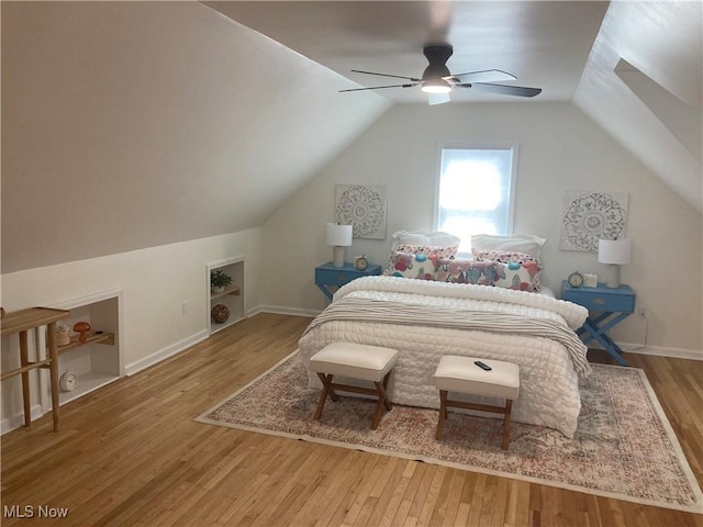6704 Northcliff Ave, Brooklyn, OH 44144 - bedroom with wood finished floors, vaulted ceiling, and a ceiling fan