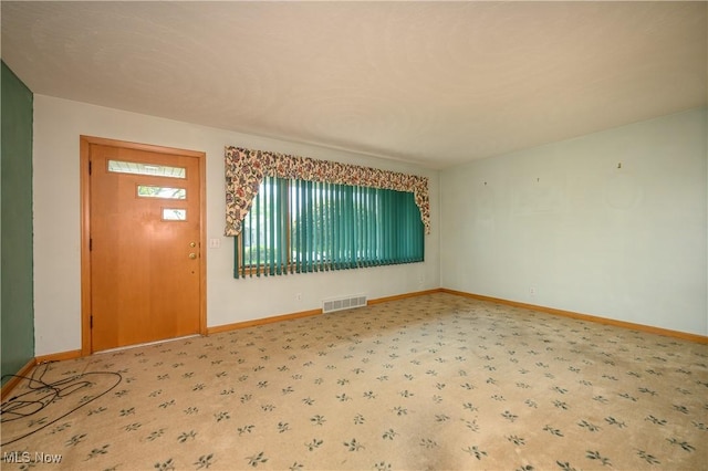 731 Hemlock St NW, Massillon, OH 44647 - entrance foyer featuring baseboards