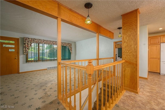 731 Hemlock St NW, Massillon, OH 44647 - hallway with an upstairs landing and carpet