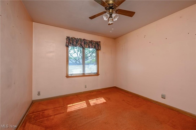 731 Hemlock St NW, Massillon, OH 44647 - carpeted spare room with a ceiling fan and baseboards