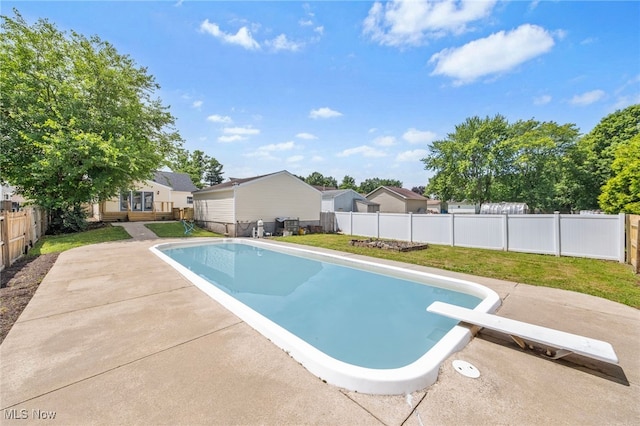 3763 Orchard St, Mogadore, OH 44260 - view of pool with a fenced backyard, a patio, a diving board, and a residential view
