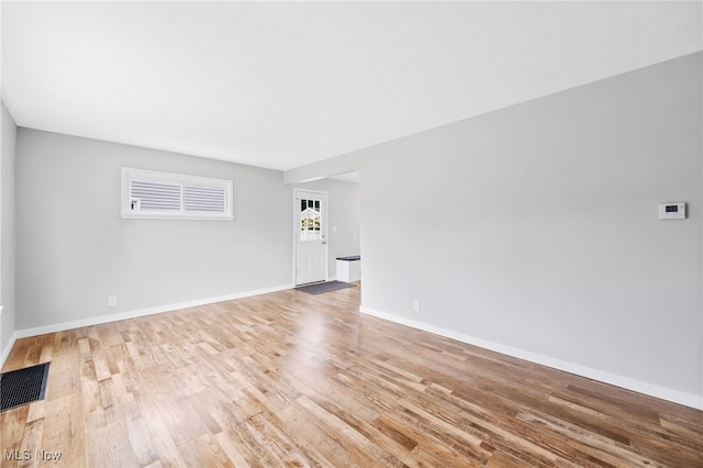 3763 Orchard St, Mogadore, OH 44260 - unfurnished room featuring light wood-style flooring and baseboards