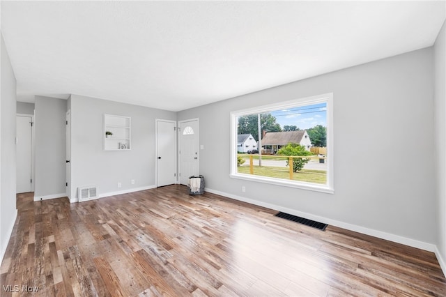 3763 Orchard St, Mogadore, OH 44260 - unfurnished living room with wood finished floors