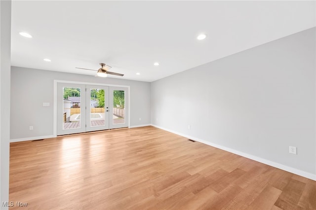 3763 Orchard St, Mogadore, OH 44260 - empty room featuring recessed lighting, light wood-style floors, french doors, and ceiling fan