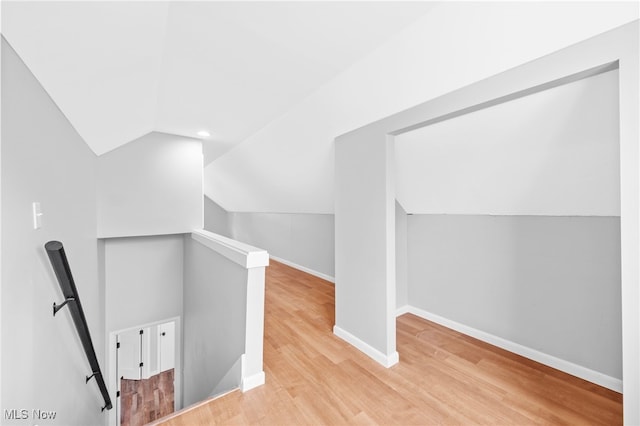 3763 Orchard St, Mogadore, OH 44260 - additional living space featuring lofted ceiling and light wood-style flooring