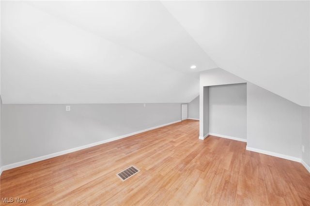 3763 Orchard St, Mogadore, OH 44260 - additional living space with wood finished floors, lofted ceiling, and recessed lighting