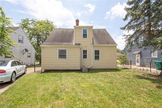 16005 Mendota Ave, Maple Heights, OH 44137 - back of property featuring a chimney and roof with shingles
