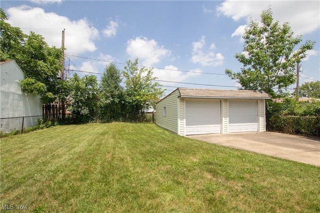 16005 Mendota Ave, Maple Heights, OH 44137 - view of yard with an outdoor structure and a detached garage