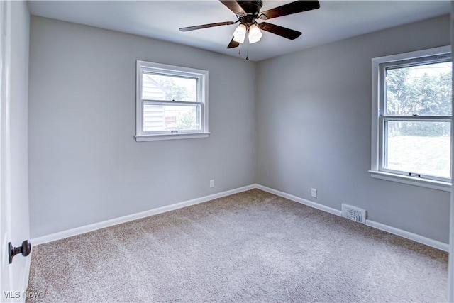 16005 Mendota Ave, Maple Heights, OH 44137 - carpeted spare room with baseboards and a ceiling fan