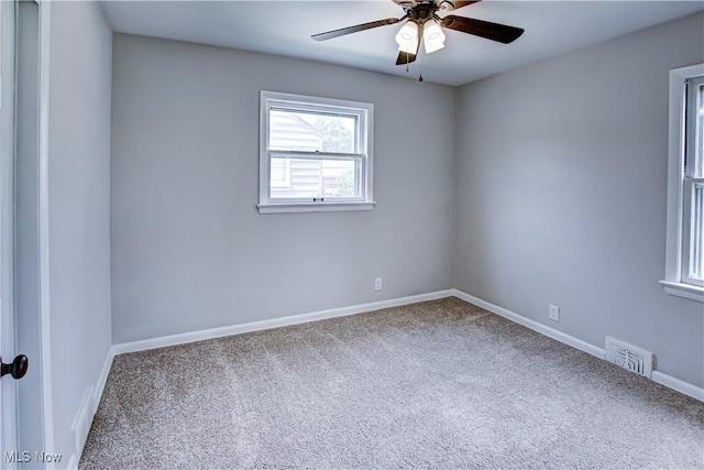 16005 Mendota Ave, Maple Heights, OH 44137 - spare room featuring carpet flooring and a ceiling fan