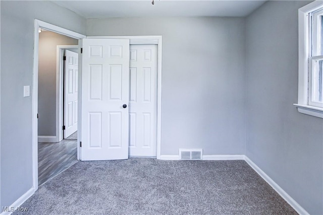 16005 Mendota Ave, Maple Heights, OH 44137 - unfurnished bedroom with carpet floors and a closet