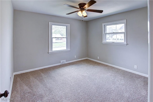 16005 Mendota Ave, Maple Heights, OH 44137 - carpeted spare room with a ceiling fan and baseboards