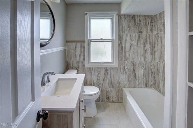 16005 Mendota Ave, Maple Heights, OH 44137 - bathroom with tile walls, vanity, and marble finish flooring