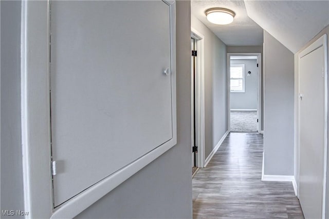16005 Mendota Ave, Maple Heights, OH 44137 - hallway with baseboards and wood finished floors