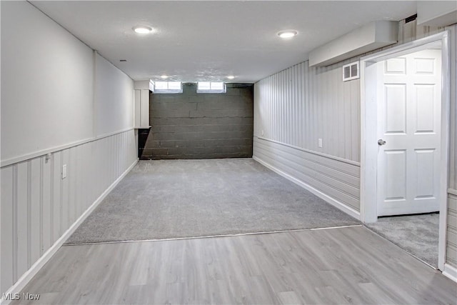 16005 Mendota Ave, Maple Heights, OH 44137 - basement featuring wood finished floors and concrete block wall