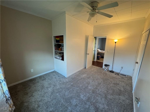 3868 Adams Ave, Shadyside, OH 43947 - unfurnished bedroom with carpet, crown molding, and a ceiling fan