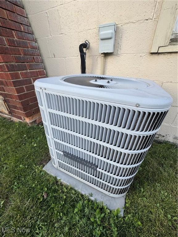 3868 Adams Ave, Shadyside, OH 43947 - exterior view of a central air condition unit