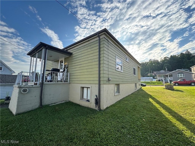 3868 Adams Ave, Shadyside, OH 43947 - view of property exterior with a yard