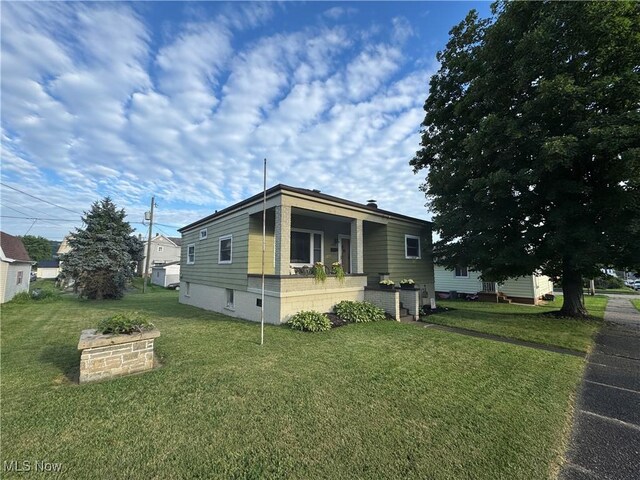 3868 Adams Ave, Shadyside, OH 43947 - view of front of home featuring a front lawn