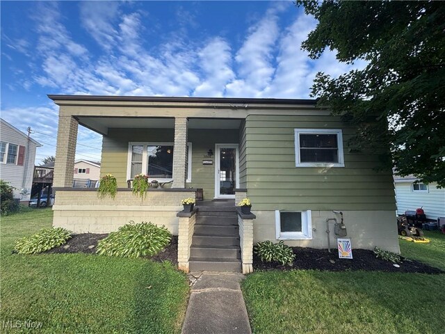 3868 Adams Ave, Shadyside, OH 43947 - view of front of house featuring a front lawn and a porch