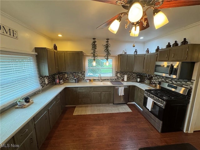 3868 Adams Ave, Shadyside, OH 43947 - kitchen with appliances with stainless steel finishes, light countertops, decorative backsplash, a ceiling fan, and ornamental molding