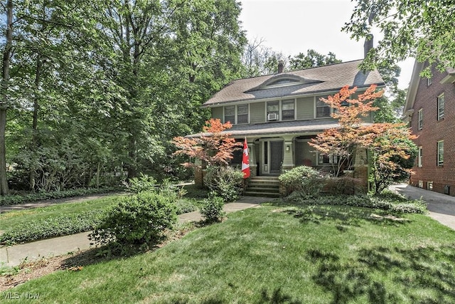 1539 Compton Rd, Cleveland Heights, OH 44118 - view of front facade featuring a porch and a front lawn