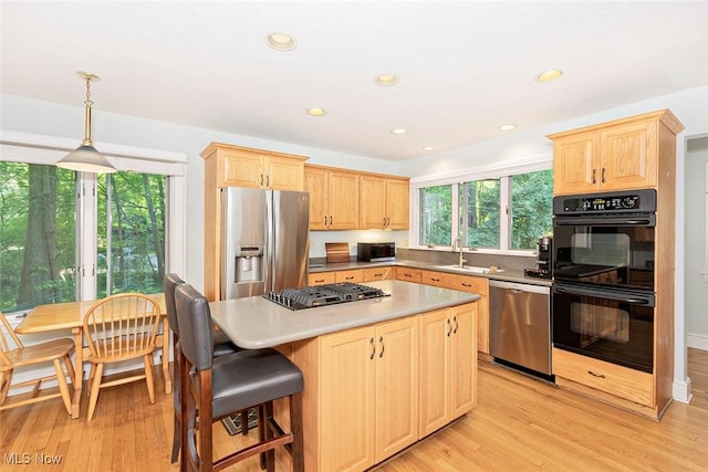 1539 Compton Rd, Cleveland Heights, OH 44118 - kitchen featuring stainless steel appliances, light brown cabinets, light wood-style flooring, and recessed lighting