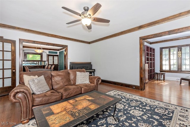1539 Compton Rd, Cleveland Heights, OH 44118 - living area featuring ceiling fan, wood finished floors, and crown molding