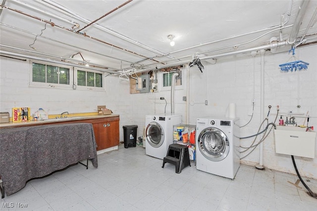 1539 Compton Rd, Cleveland Heights, OH 44118 - washroom featuring light flooring, washing machine and dryer, electric panel, and concrete block wall