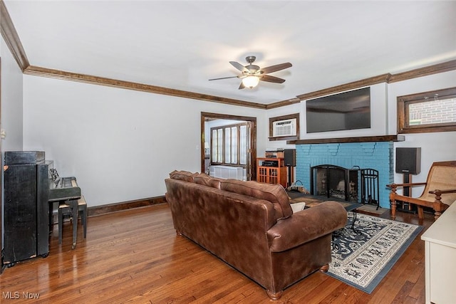 1539 Compton Rd, Cleveland Heights, OH 44118 - living area featuring ornamental molding, a ceiling fan, a fireplace, hardwood / wood-style floors, and a wall mounted AC