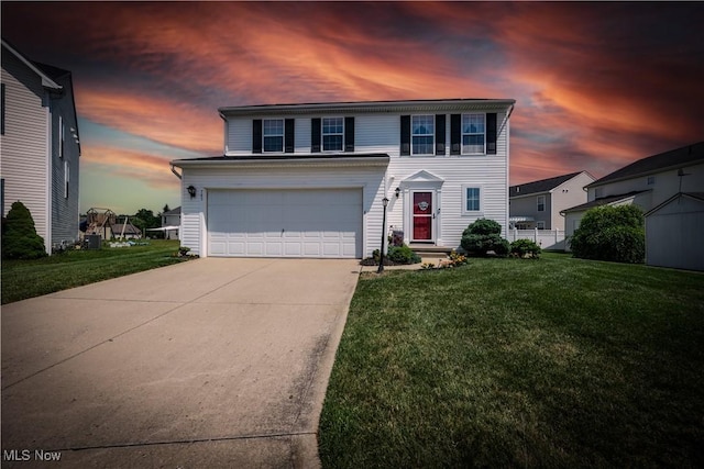 785 Cambridge Ct, Kent, OH 44240 - view of front of home featuring concrete driveway, a front lawn, and an attached garage