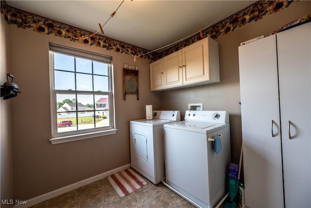 785 Cambridge Ct, Kent, OH 44240 - laundry area featuring cabinet space and separate washer and dryer