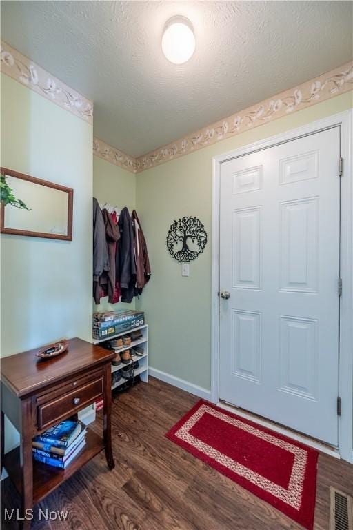 785 Cambridge Ct, Kent, OH 44240 - foyer with wood finished floors and a textured ceiling