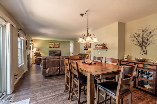 785 Cambridge Ct, Kent, OH 44240 - dining area featuring dark wood-type flooring and a chandelier