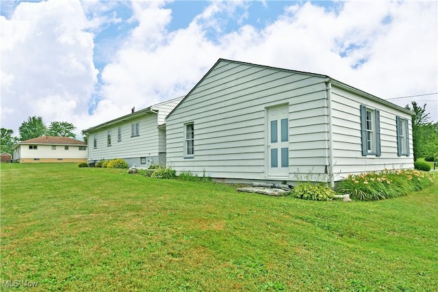 3787 Helsey Fusselman Rd, Southington, OH 44470 - view of side of home featuring a lawn