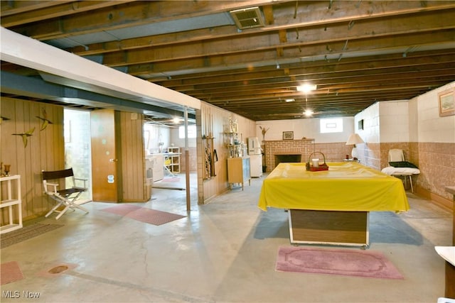 3787 Helsey Fusselman Rd, Southington, OH 44470 - below grade area with pool table, a fireplace, and healthy amount of natural light