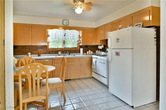 3787 Helsey Fusselman Rd, Southington, OH 44470 - kitchen with white appliances, wallpapered walls, ceiling fan, light countertops, and light tile patterned floors