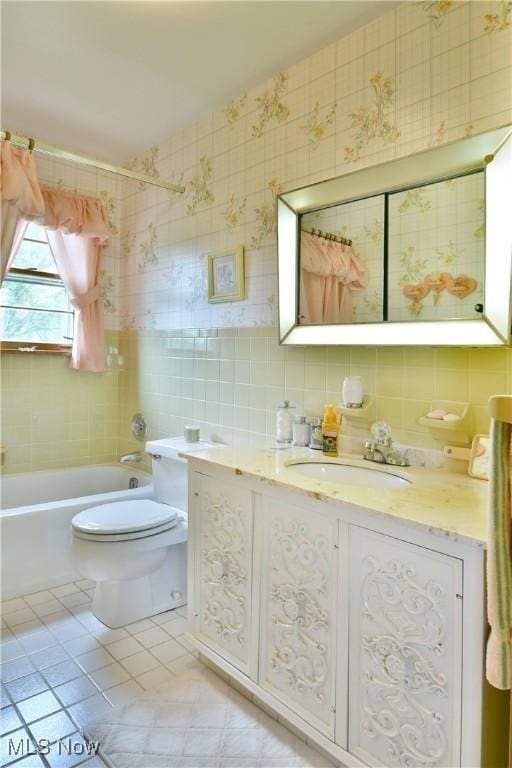 3787 Helsey Fusselman Rd, Southington, OH 44470 - full bathroom with tile patterned floors, tile walls, vanity, and decorative backsplash