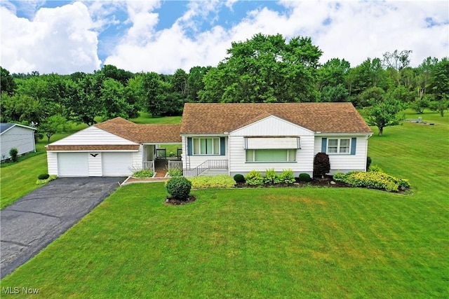 3787 Helsey Fusselman Rd, Southington, OH 44470 - ranch-style home with an attached garage, driveway, and a front lawn