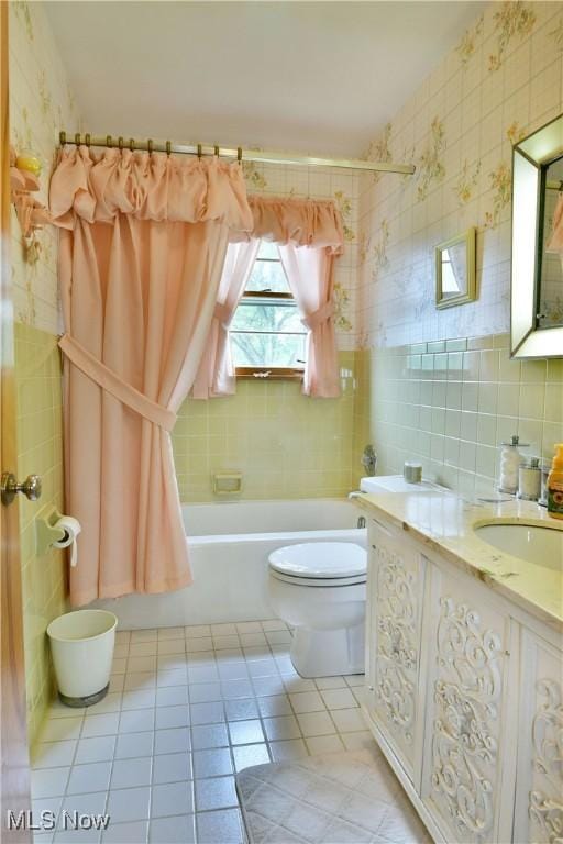 3787 Helsey Fusselman Rd, Southington, OH 44470 - full bath featuring tile walls, tile patterned floors, vanity, and washtub / shower combination