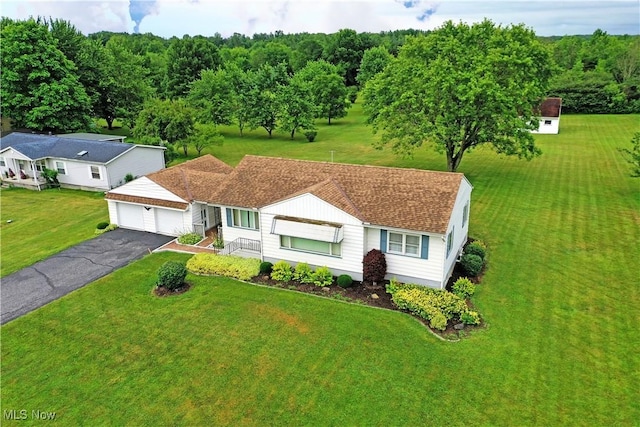 3787 Helsey Fusselman Rd, Southington, OH 44470 - view of front of property featuring driveway, a front yard, an attached garage, and roof with shingles