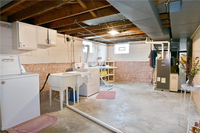3787 Helsey Fusselman Rd, Southington, OH 44470 - basement with independent washer and dryer and heating unit