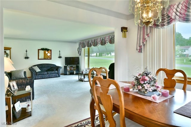 3787 Helsey Fusselman Rd, Southington, OH 44470 - carpeted dining space with a chandelier