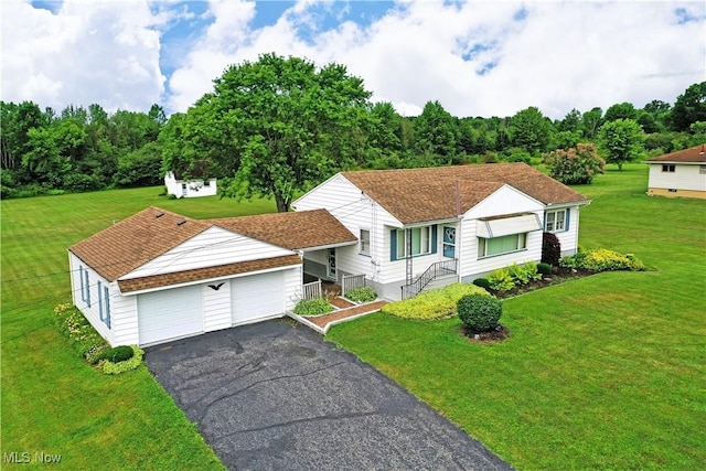 3787 Helsey Fusselman Rd, Southington, OH 44470 - view of front facade with a garage, driveway, and a front yard