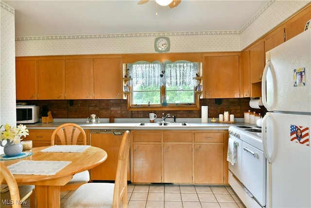 3787 Helsey Fusselman Rd, Southington, OH 44470 - kitchen featuring white appliances, wallpapered walls, light countertops, a ceiling fan, and backsplash